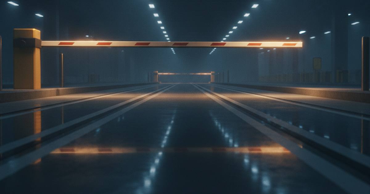 Empty customs inspection hall with a raised barrier